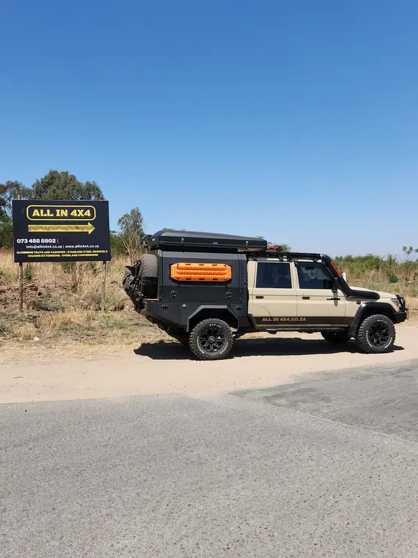 Land Cruiser 79 with flatbed and canopy
