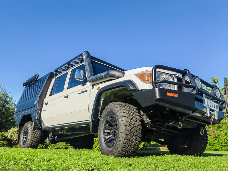 Land Cruiser 79 with an All In 4x4 extended chassis and canopy