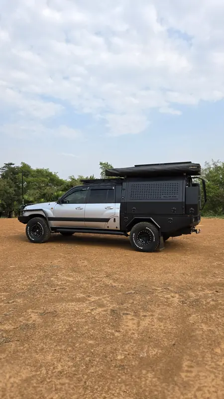 Converted Land Cruiser 200 Series with an All In 4x4 canopy