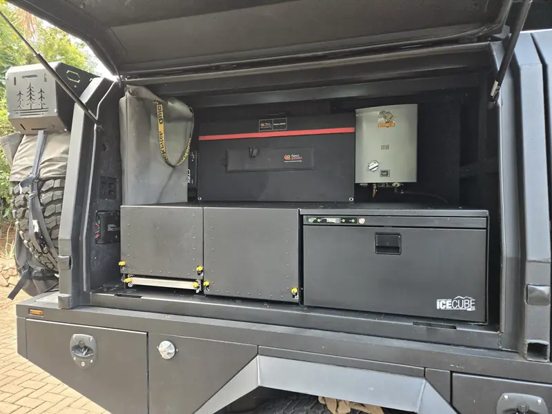 Electrical and water system built into an All In 4x4 canopy