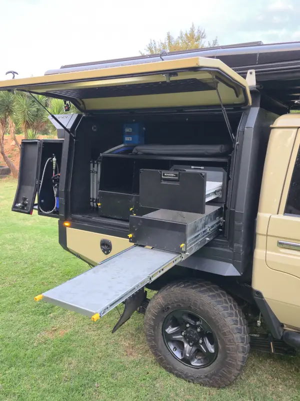 Slide out table on an All In 4x4 canopy