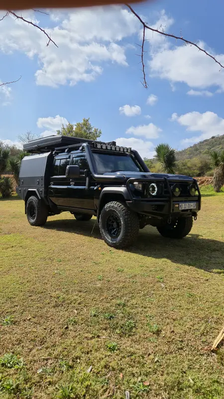 Land Cruiser 79 with a roof top tent canopy