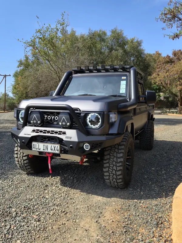 Toyota 79 Series Land Cruiser front view with a stainless steel snorkel