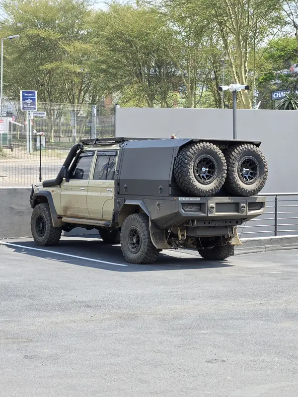 Six wheel Land Cruiser conversion with an All In 4x4 tray